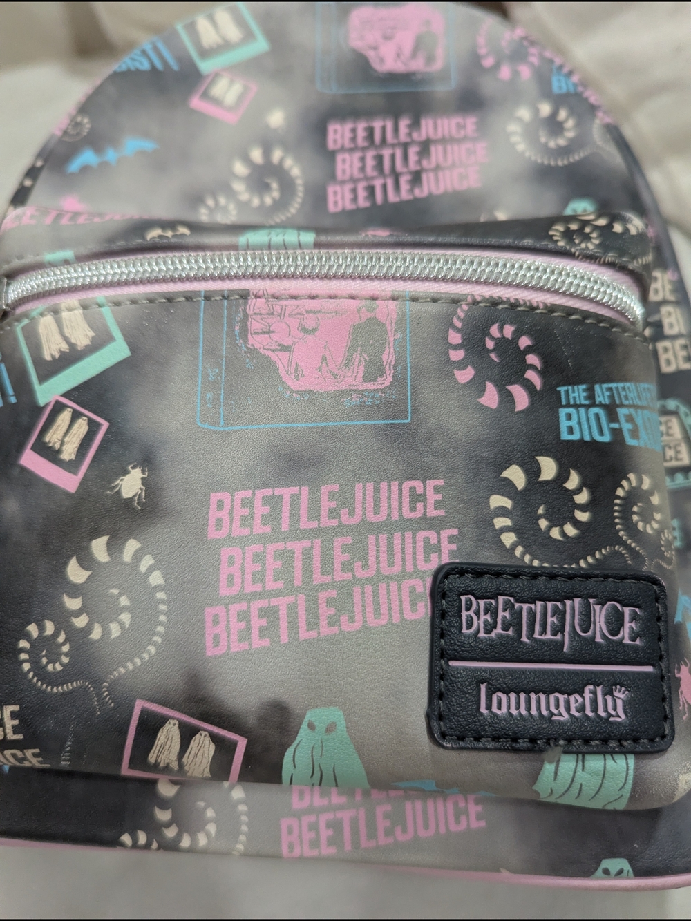 Loungefly Beetlejuice Mini Backpack - Black with Pink & Teal Print - Picture 2 of 6